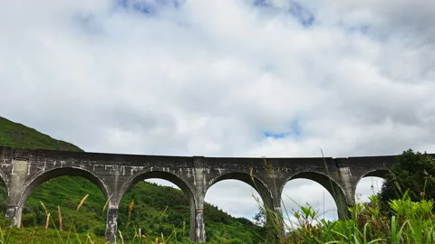 Time lapse of clouds passing over the famous Glenfinnan Viaduct in the Stock Footage 342212258