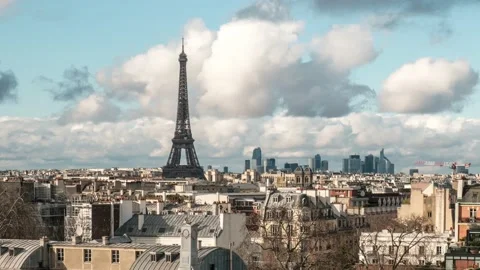 Time lapse of clouds passing rooftops and Eiffel Tower in Paris Stock Footage 238591282