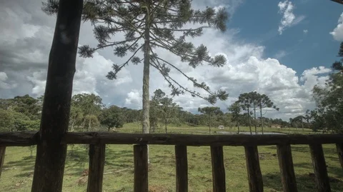 Time lapse of clouds passing in a rural landscape, dolly shot 2K Stock Footage 88925961