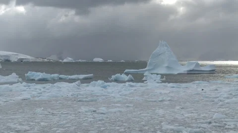 Time lapse clouds race across frozen seascape, Antarctica Stock Footage 34313595