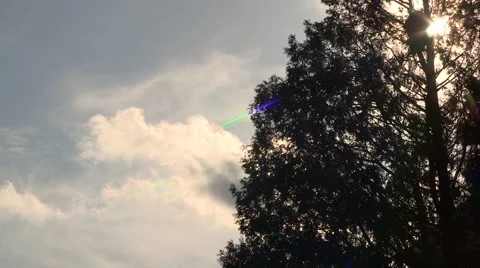 Time Lapse of Clouds with rainbow Flare Video stock 49018462