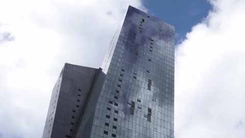 Time Lapse Of Clouds Reflected In City Skyscraper Building Windows - Melbourne 動画素材 248439325