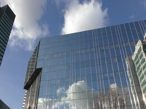 Time lapse. Clouds reflected in a glassed building. Stock Footage 72797285