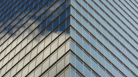 Time Lapse of Clouds Reflection on Glass Office Building in Tokyo Japan 42943102
