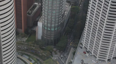 Time Lapse of clouds rolling by at office buildings in financial district Video stock 35409911