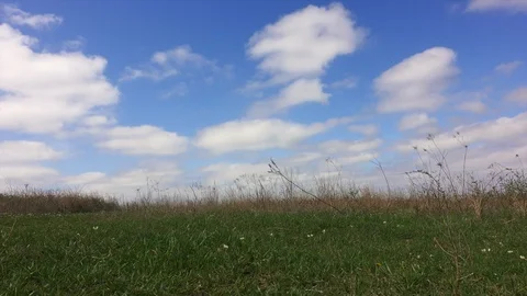 Time lapse of clouds rolling over natural prairie Stock Footage 92955211