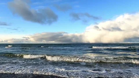 Time-Lapse Of Clouds Rolling Over The Beautiful Sea On A Sunny Day Stock Footage 221577127