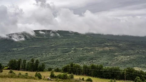 Time-Lapse of Clouds Rolling Over Mountains in Trøndelag, Norway Stock Footage 315073981