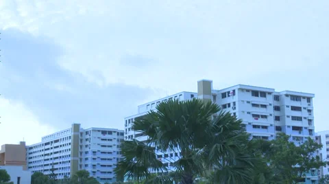 Time Lapse of clouds rolling by at Singapore apartments Video stock 35406723