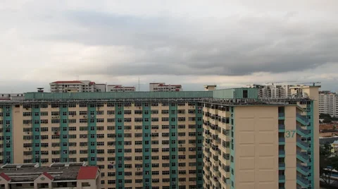 Time Lapse of clouds rolling by at Singapore apartments Video stock 35406906