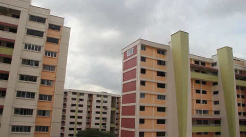 Time Lapse of clouds rolling by at Singapore apartments Video stock 35407069