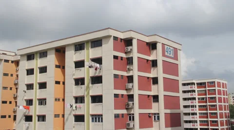 Time Lapse of clouds rolling by at Singapore apartments Video stock 35407394