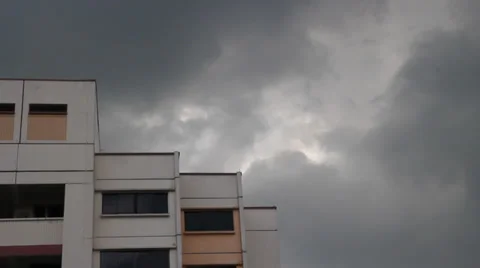 Time Lapse of clouds rolling by at Singapore apartments Video stock 35407948