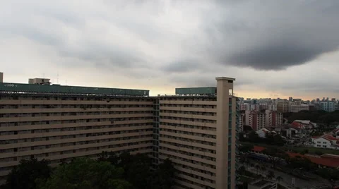 Time Lapse of clouds rolling by at Singapore apartments Video stock 35409029