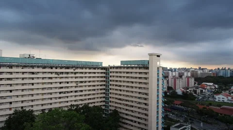 Time Lapse of clouds rolling by at Singapore apartments Video stock 35409214