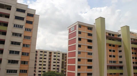 Time Lapse of clouds rolling by at Singapore apartments Video stock 35409384