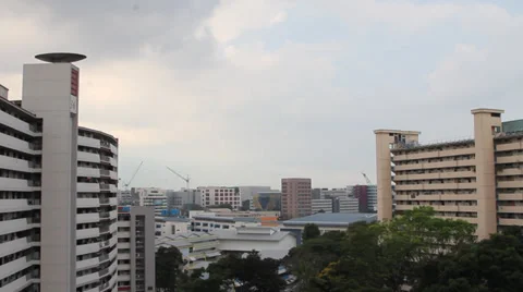 Time Lapse of clouds rolling by at Singapore apartments Video stock 35409748