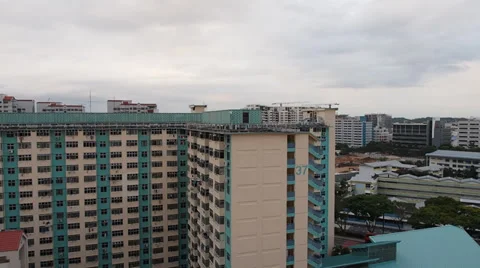 Time Lapse of clouds rolling by at Singapore apartments Video stock 35409987