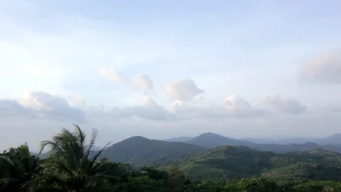 Time lapse of the clouds rolling in the sky in the mountains Stock Footage 73356997
