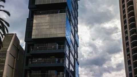 Time lapse of clouds rolling through city skyscrapers in Auckland, New Zealand. Stock Footage 91469078