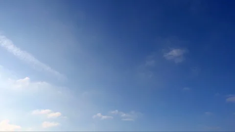 Time lapse of the clouds running across blue sky Stock Footage 101687626