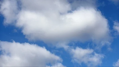 Time lapse of the clouds running across blue sky Stock Footage 103313751