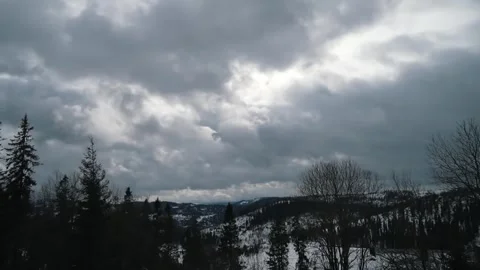 Time lapse of clouds running across the white sky over an amazing landscape of Stock Footage 265303149