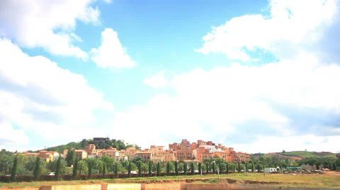 Time lapse of clouds running over old style europe village,. Stock Footage 45961887
