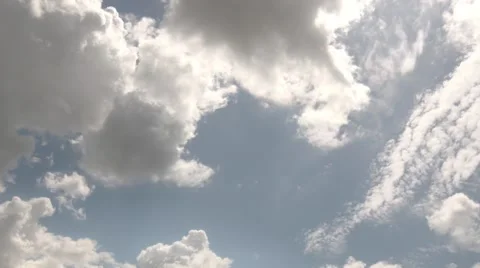 Time lapse of clouds shot in HDR. Light clouds then dark moves in. Video stock 41147847