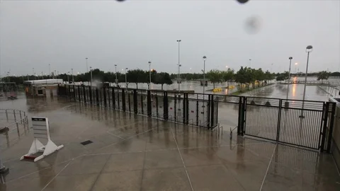 Time lapse of clouds, spectators arriving and departing football stadium Stock Footage 105422750