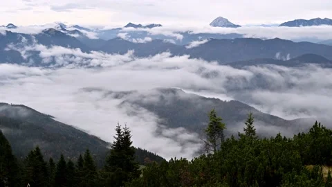 Time-lapse clouds streaming over the mountains in Austrian Alps 動画素材 219206955