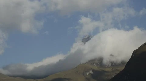 Time lapse of clouds swirling around the peak of Nevado del Tolima in Colombia Stock Footage 63306692