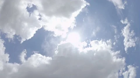 Time Lapse Clouds Swirling Over Sun Stock Footage 169750713