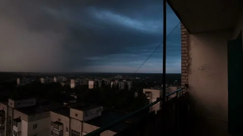 Time lapse of clouds through view of derelict building window at balcony Stock Footage 162464418