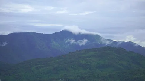 Time-lapse of clouds touching mountain peaks 4k file 15 Stock Footage 339268145
