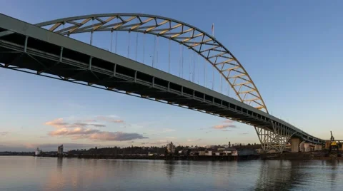 Time lapse of clouds traffic and race boats with Fremont bridge in Portland OR Video stock 61119362