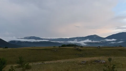 Time Lapse clouds travel over mountains Stock Footage 85672230
