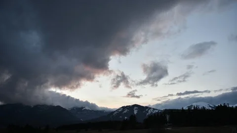 Time Lapse clouds travel over mountains Stock Footage 85982837