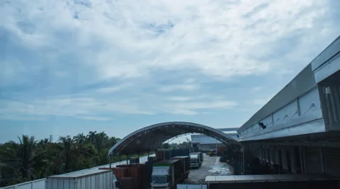 Time lapse clouds at warehouse Stock Footage 45386400