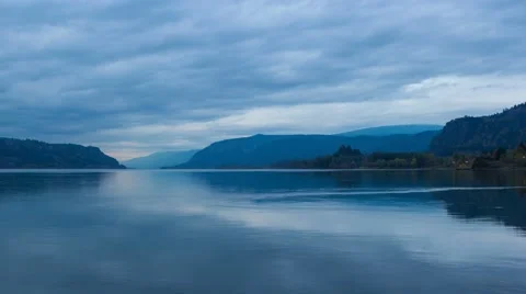 Time Lapse of clouds with water reflection Columbia River Gorge at blue hour 4k Video stock 56747754