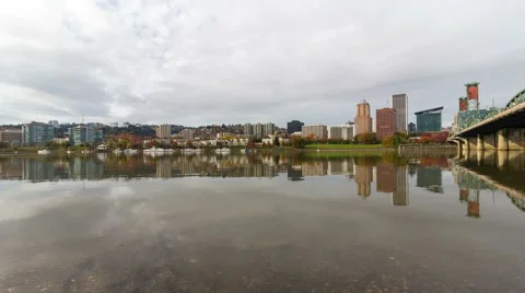 Time lapse of clouds with water reflection over city of Portland OR fall season Stock Footage 68828169
