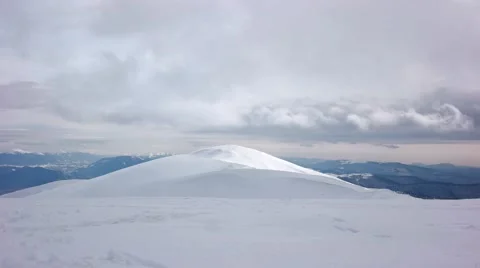 Time-Lapse of Clouds in the Winter Mountains Stock-Footage 61009734