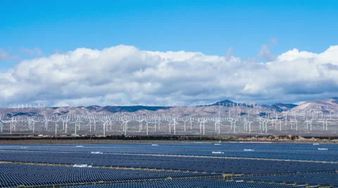 Time Lapse - Cloudscape above Solar Panel with Wind Turbine Field 库存影片 48783176