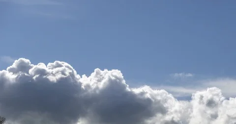 Time lapse of cloudscape behind of the mountains top. Snow, rocks, cliffs and Stock Footage 118733461