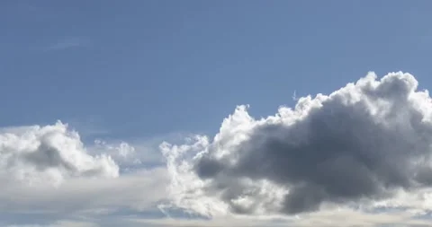 Time lapse of cloudscape behind of the mountains top. Snow, rocks, cliffs and Stock Footage 236463265