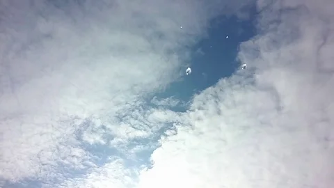 Time lapse of cloudscape with bright sun shining with clouds passing. Stock Footage 85387136