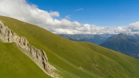 Time lapse of cloudscape with clouds over the green mountain of Arkhyz. Stock Footage 94718210