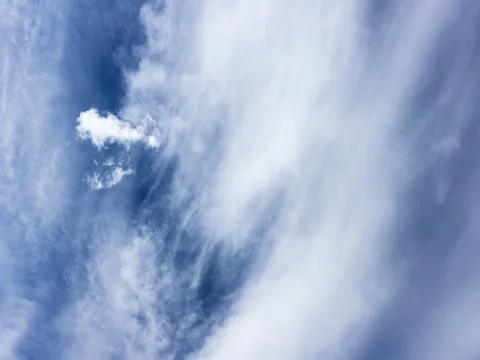 Time lapse of cloudscape with clouds passing blue sky. Stock Footage 75873522