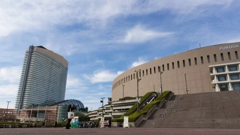 Time-lapse of cloudscape at huge stadium and building Stock Footage 73064238