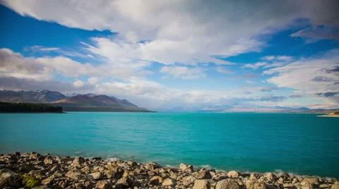 Time Lapse - Cloudscape of Lake  Pukaki, New Zealand, Panning View Stock Footage 58630009